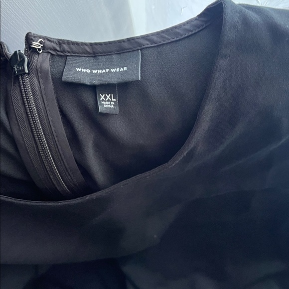 2 dresses. Black Polka Dot Tiered Dress & Solid Black Ruffle Hem Dress - Picture 6 of 7